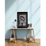 Thoughtful and focused old woman painting